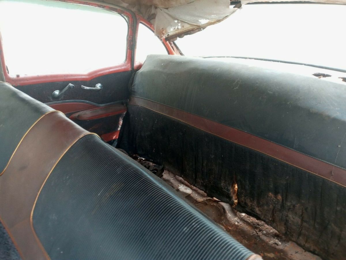 1957 Red Chevrolet Bel Air/150/210 Sedan