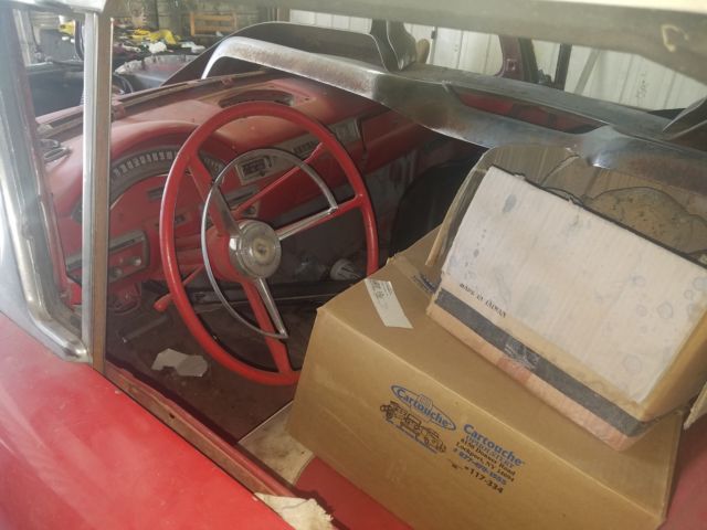 1957 Red Ford Fairlane Convertible