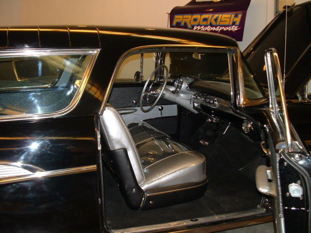 1957 black Chevrolet Nomad