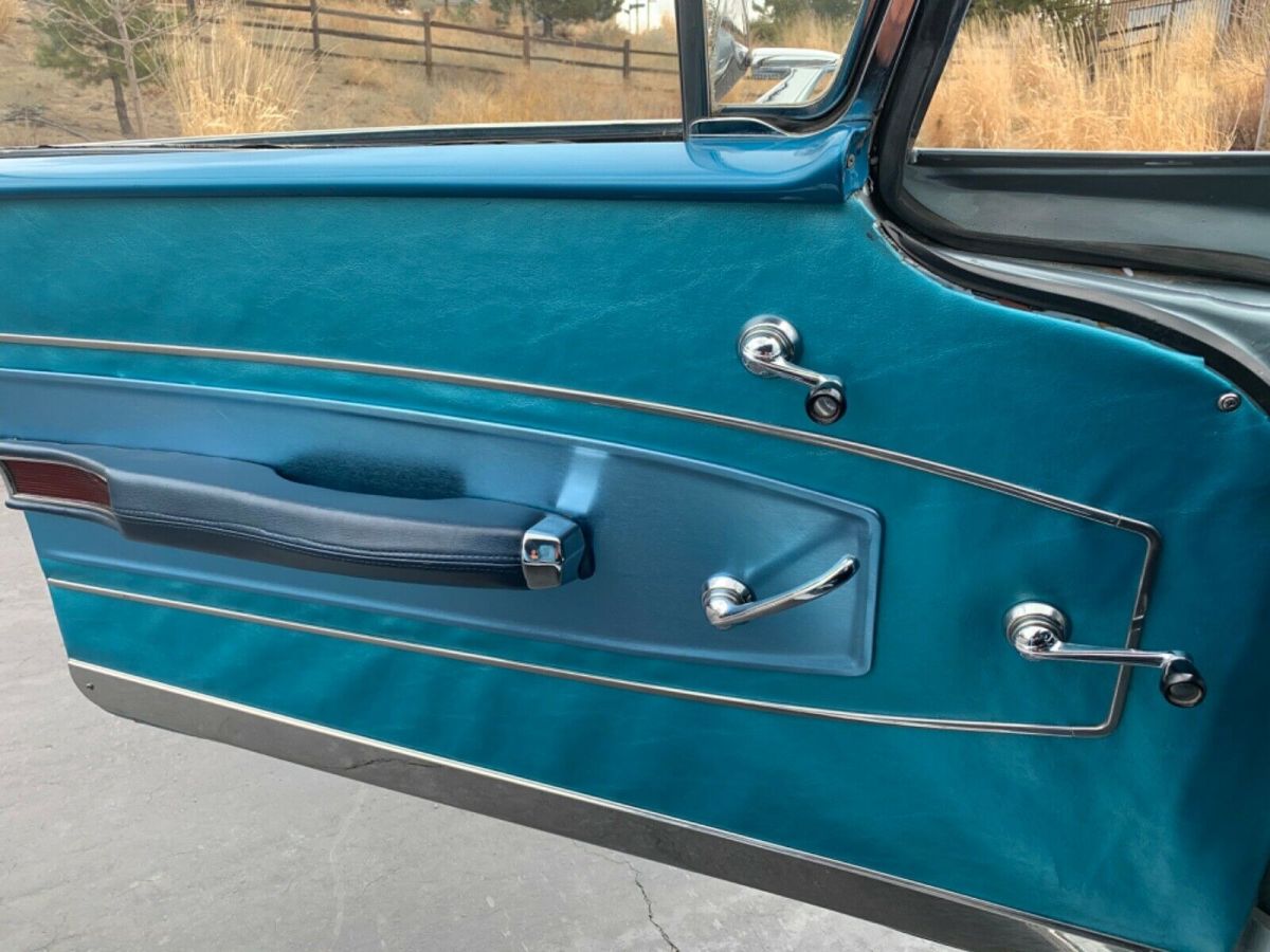 1958 Holiday blue/ antique white Chevrolet Impala Coupe