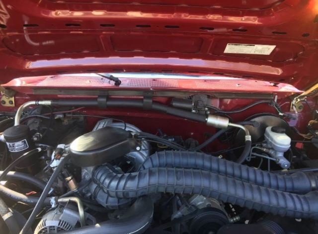 1993 Burgundy Ford Bronco SUV