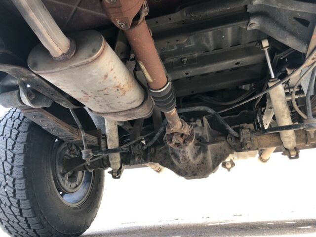 1993 Burgundy Ford Bronco SUV