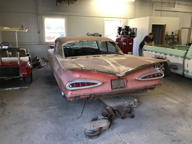 1959 Red Chevrolet Bel Air/150/210 Sedan