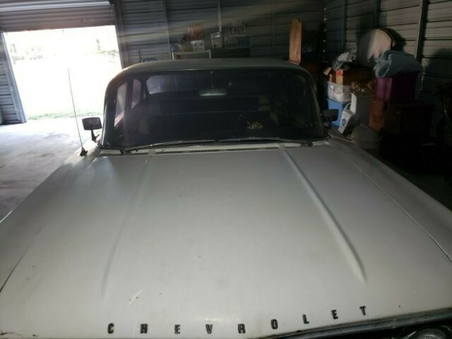 1960 white Chevrolet Impala Sedan