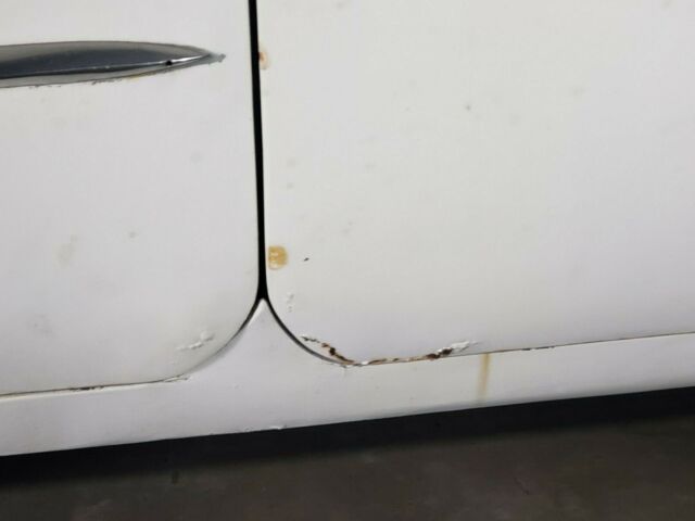 1960 white Chevrolet Impala Sedan