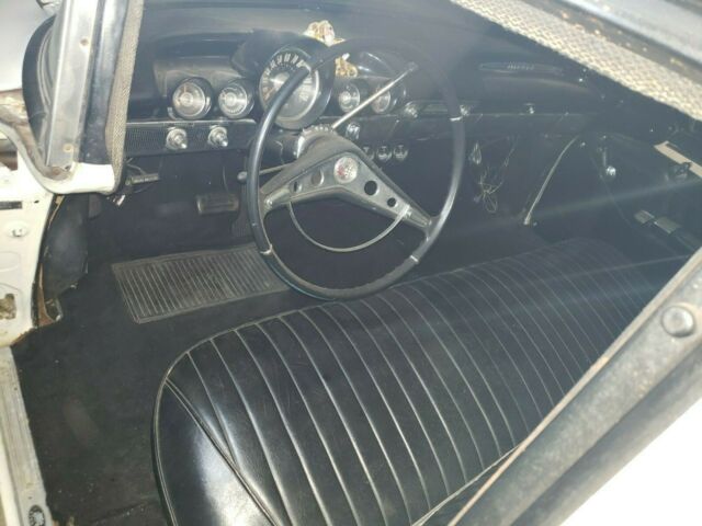 1960 white Chevrolet Impala Sedan