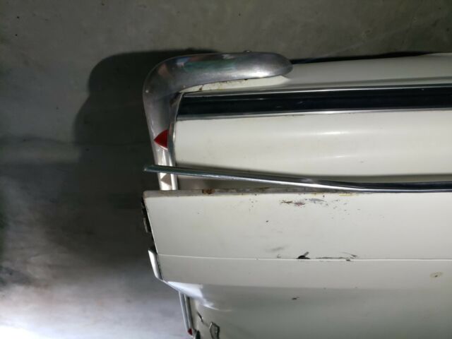 1960 white Chevrolet Impala Sedan