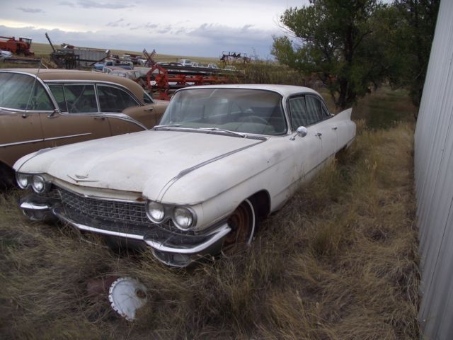 1960 White Cadillac DeVille Sedan
