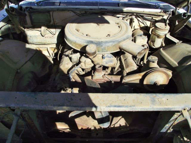 1960 White Cadillac DeVille Sedan