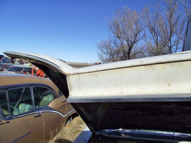1960 White Cadillac DeVille Sedan