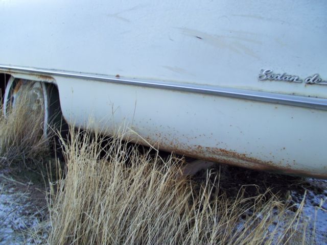 1960 White Cadillac DeVille Sedan