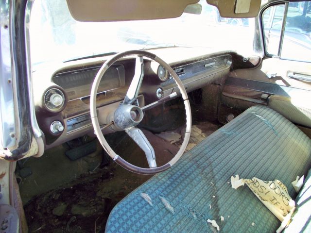 1960 White Cadillac DeVille Sedan