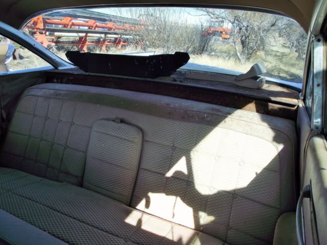 1960 White Cadillac DeVille Sedan