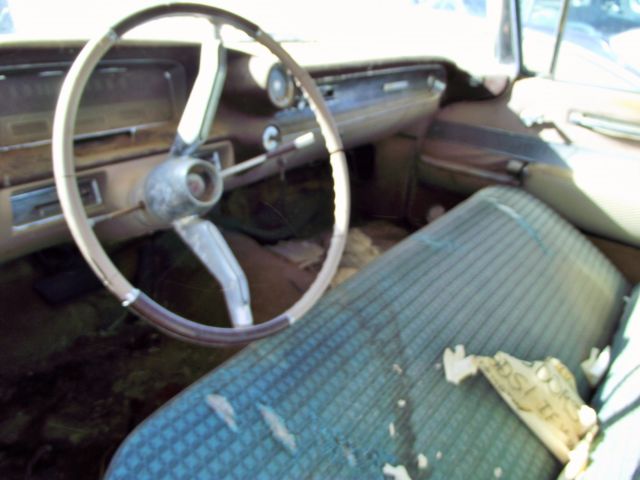 1960 White Cadillac DeVille Sedan