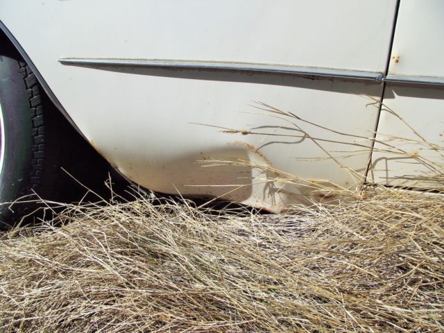 1960 White Cadillac DeVille Sedan