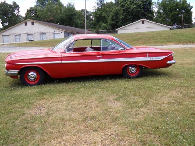 1961 Red Chevrolet Impala Coupe