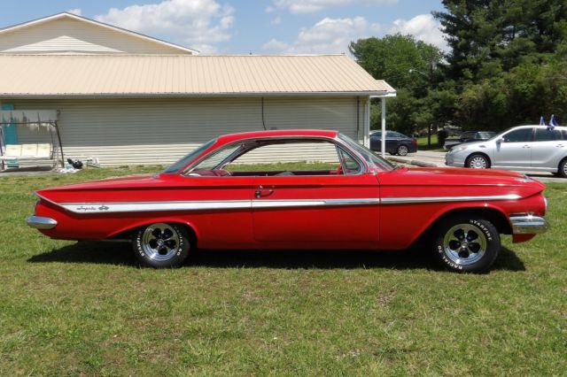 1961 Red Chevrolet Impala Coupe