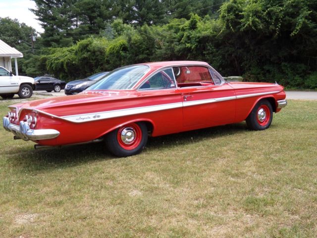 1961 Red Chevrolet Impala Coupe