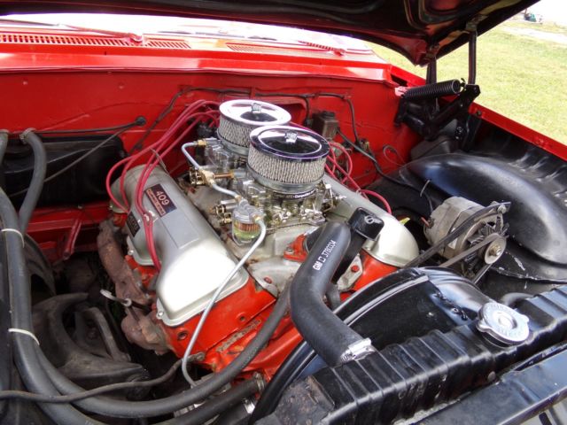 1961 Red Chevrolet Impala Coupe