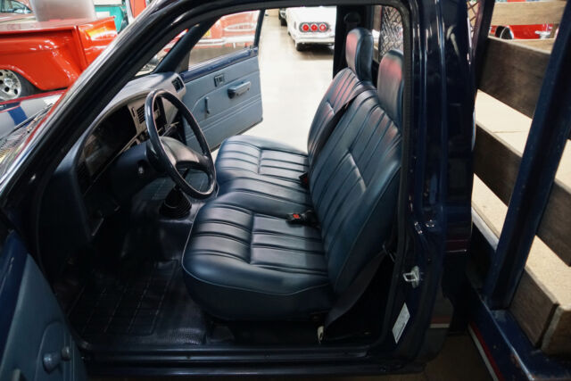 1989 Blue Toyota Stake Bed 3.0L V6 5 spd Dual Wheel Pick Up Truck w Pick Up Truck