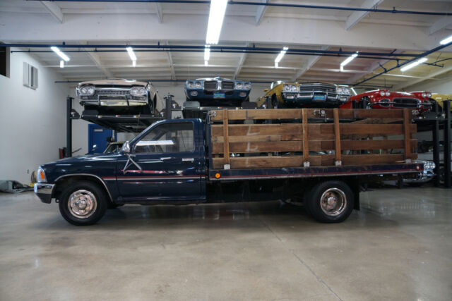 1989 Blue Toyota Stake Bed 3.0L V6 5 spd Dual Wheel Pick Up Truck w Pick Up Truck