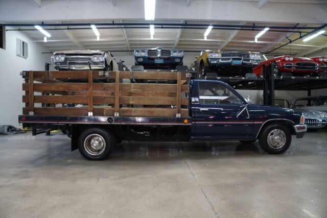 1989 Blue Toyota Stake Bed 3.0L V6 5 spd Dual Wheel Pick Up Truck w Pick Up Truck