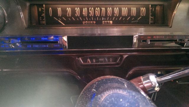 1962 Burgundy Cadillac Fleetwood Sedan