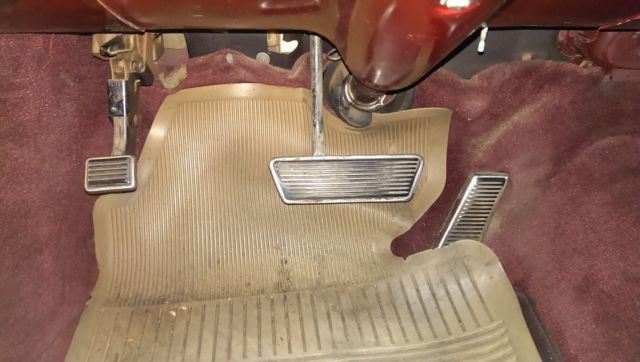 1962 Burgundy Cadillac Fleetwood Sedan