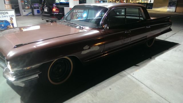 1962 Burgundy Cadillac Fleetwood Sedan