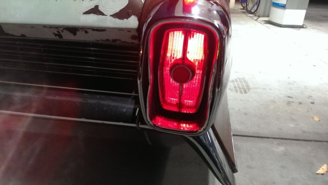 1962 Burgundy Cadillac Fleetwood Sedan