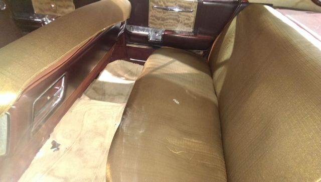 1962 Burgundy Cadillac Fleetwood Sedan