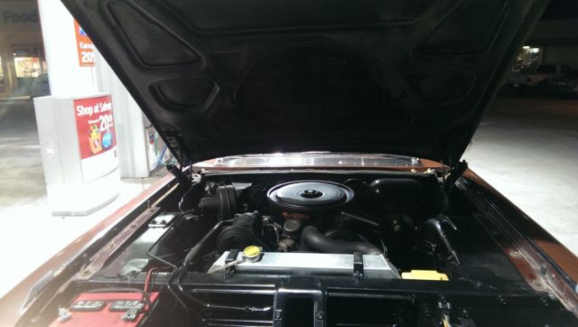 1962 Burgundy Cadillac Fleetwood Sedan