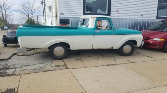 1962 Teal and white Ford F-100 Standard Cab Pickup