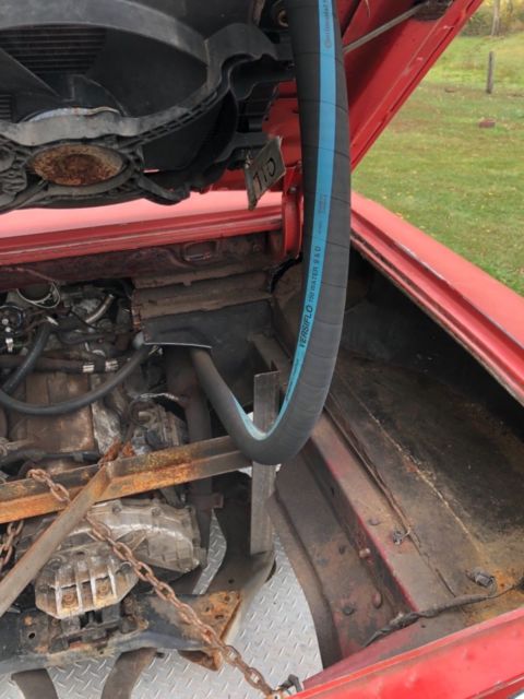 1963 Red Chevrolet Corvair Coupe