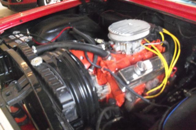 1963 red Chevrolet Impala Coupe