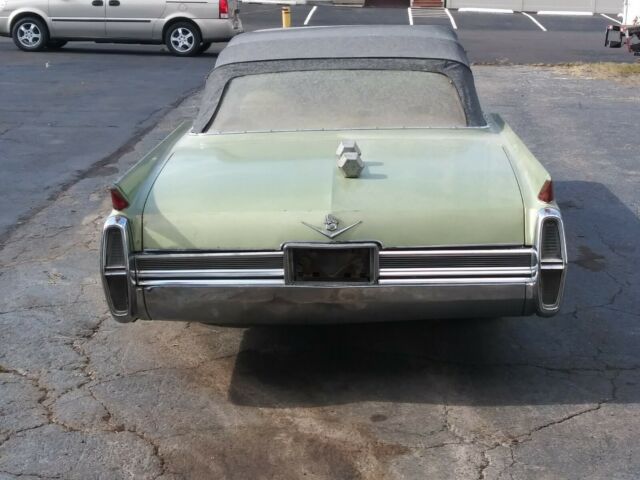 1964 Green Cadillac DeVille Convertible