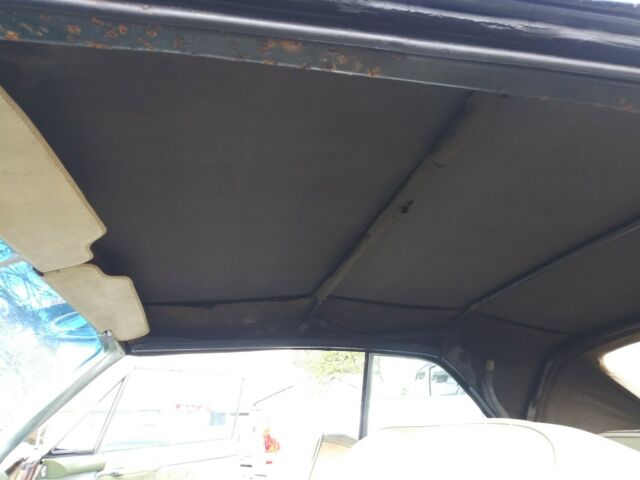 1964 Green Cadillac DeVille Convertible