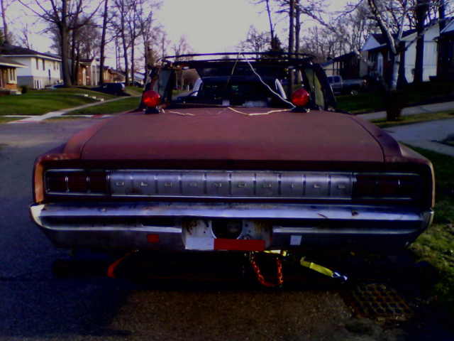 1964 Brown Oldsmobile Cutlass Convertible