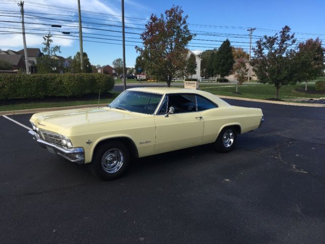 1965 Yellow Chevrolet Impala 2- Door hardtop