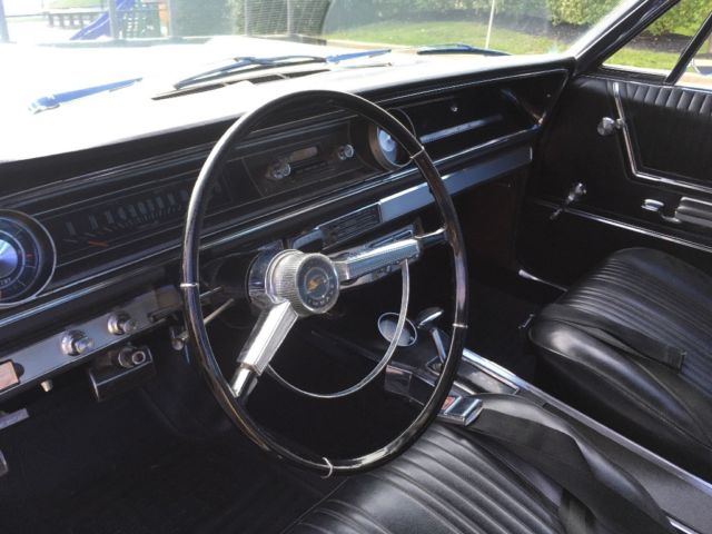 1965 Yellow Chevrolet Impala 2- Door hardtop
