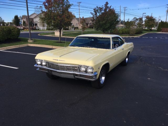 1965 Yellow Chevrolet Impala 2- Door hardtop