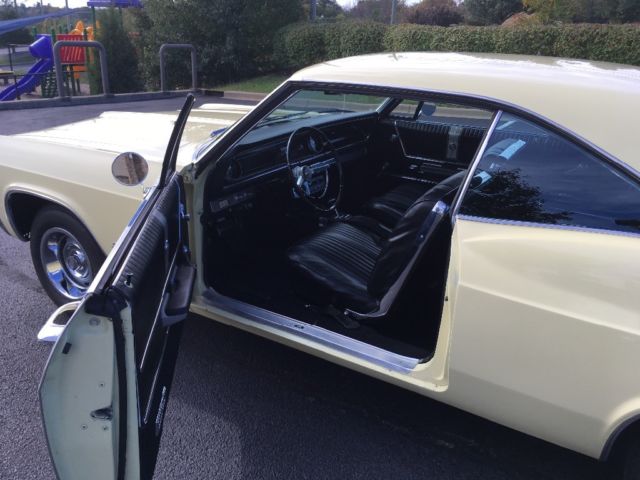 1965 Yellow Chevrolet Impala 2- Door hardtop
