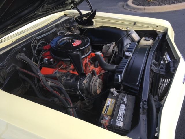 1965 Yellow Chevrolet Impala 2- Door hardtop
