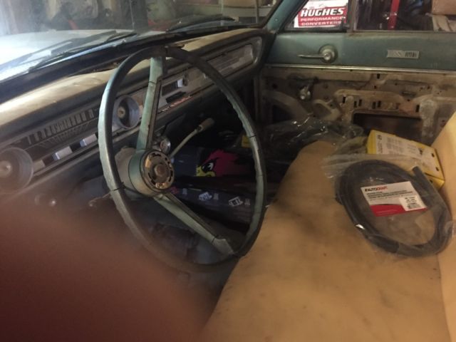 1965 white Ford Falcon Sedan