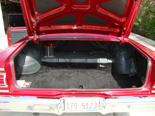 1965 crystal red metallic Chevrolet Chevelle 2 door hard top