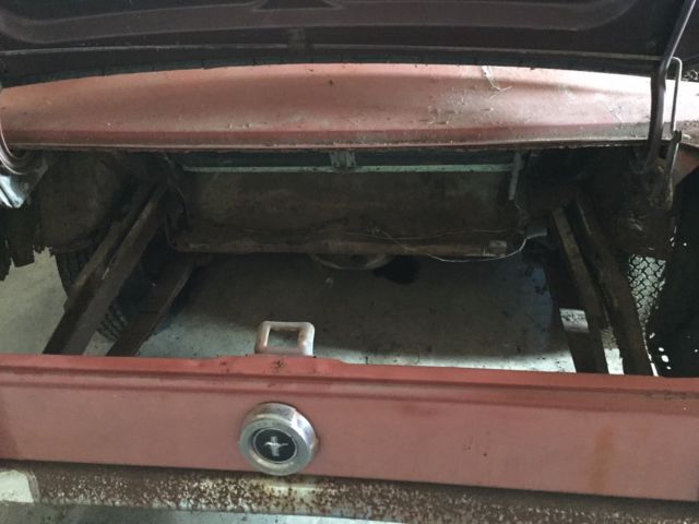 1965 vintage burgandy Ford Mustang Fastback