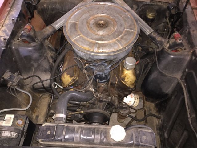 1965 vintage burgandy Ford Mustang Fastback