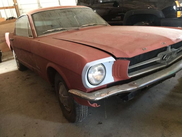 1965 vintage burgandy Ford Mustang Fastback