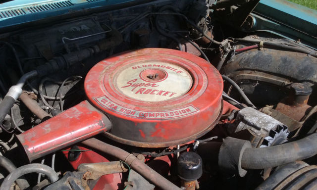 1965 blue Oldsmobile Ninety-Eight