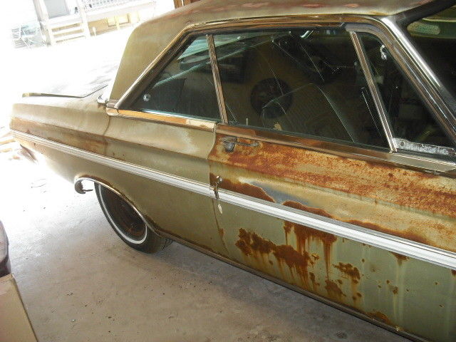1965 ruby red Plymouth Satellite Sedan